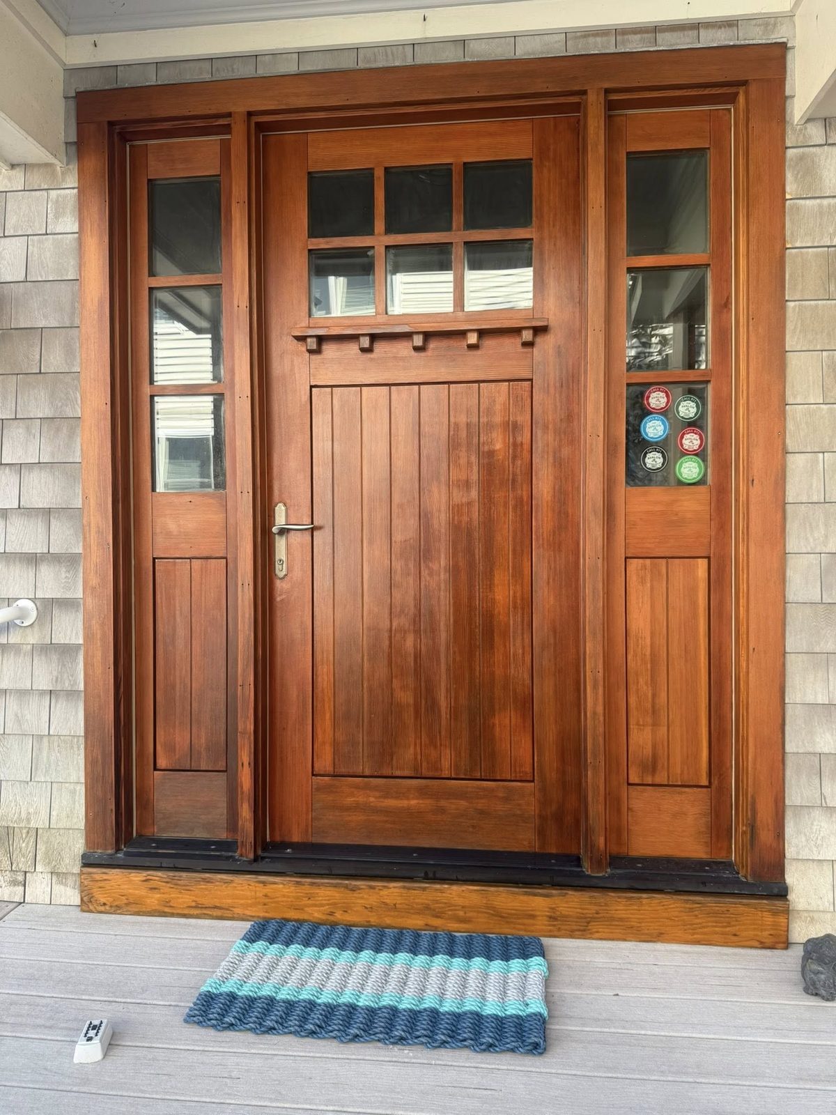 After: mahogany door fully restored, rich cherry mahogany finish