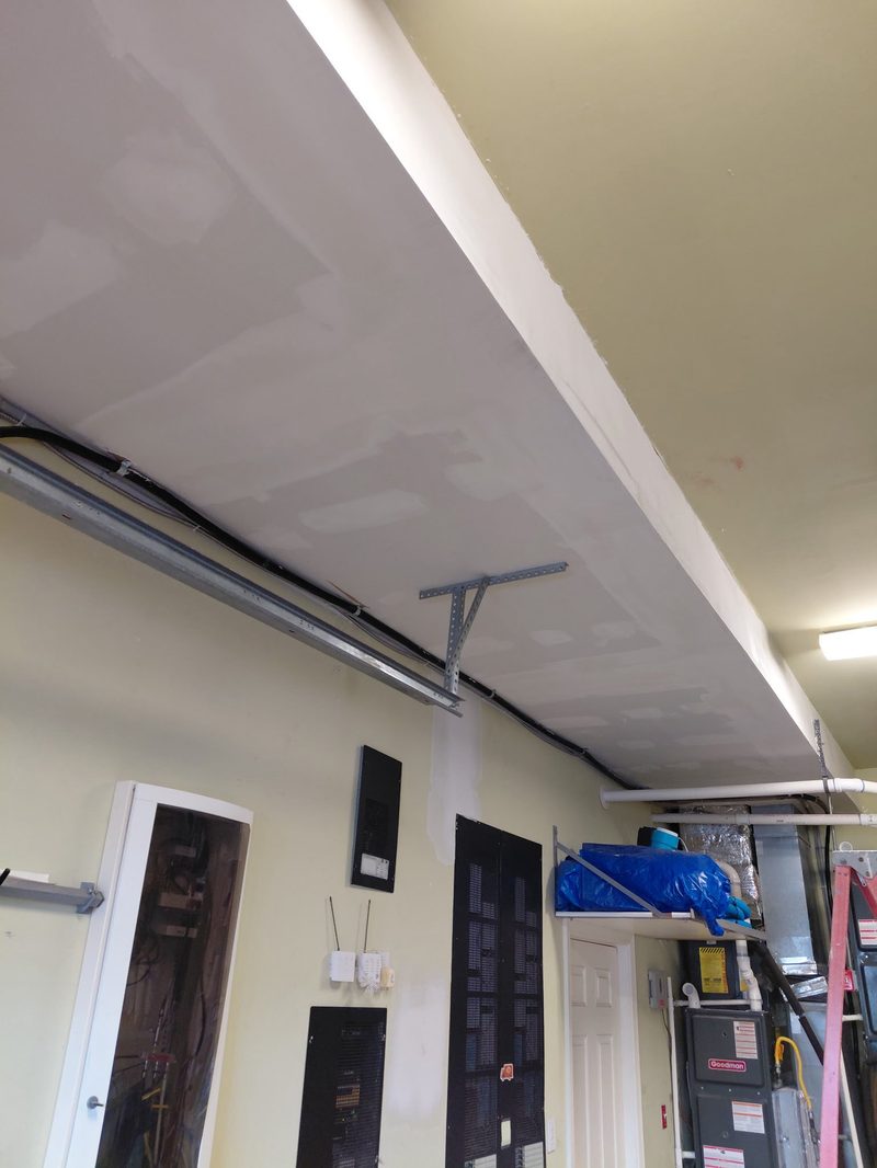 After: Soffit drywall replaced